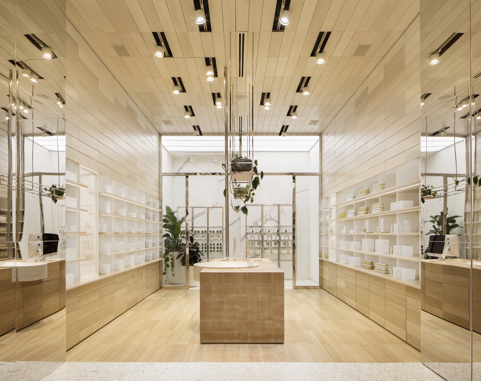 IKOU Eastland | A custom lightbox emulates an atrium in this minimalistic design.