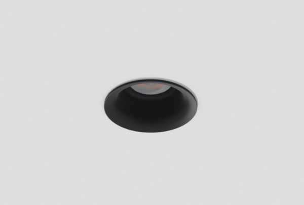 black recessed round downlight installed in ceiling