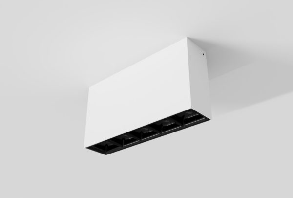 white surface mounted rectangular square segmented linear light with black inner trim installed in ceiling