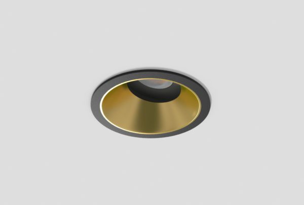black adjustable anti-glare downlight with matte gold inner trim installed in ceiling