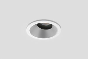 white adjustable anti-glare downlight with matte silver inner trim installed in ceiling