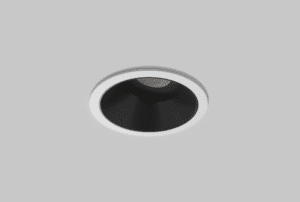 white adjustable downlight with black inner trim installed in ceiling