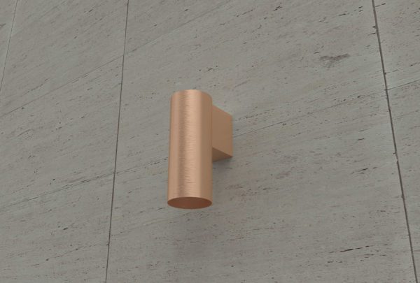 bronze can wall light installed on wall
