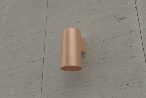 bronze can wall light installed on wall