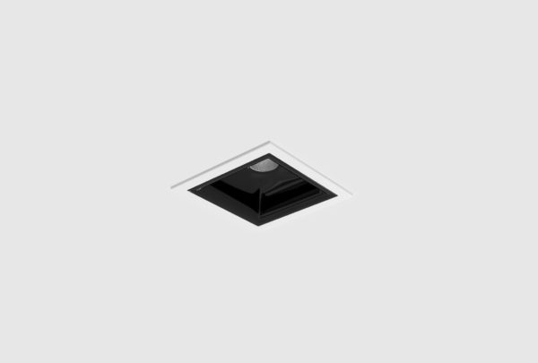 white finish recessed square spotlight with black inner trim installed in ceiling