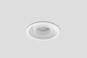 white finish aluminium spherical spotlight with round fitting installed in plaster