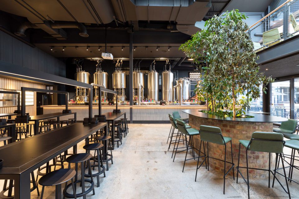 Brewery with warm LED lighting with black interior
